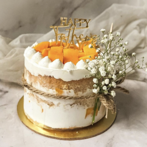 Mango cake with baby breaths