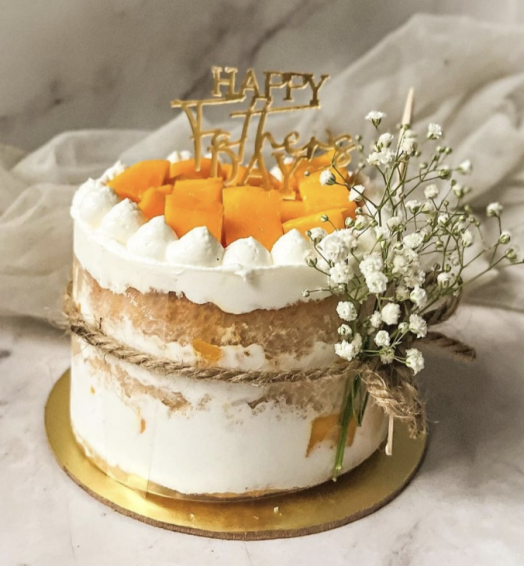 Mango cake with baby breaths
